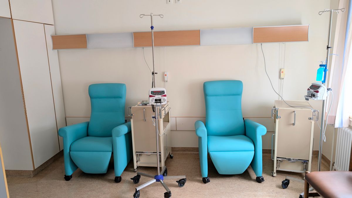 Dialysis treatment room with patient recliners and infusion stations